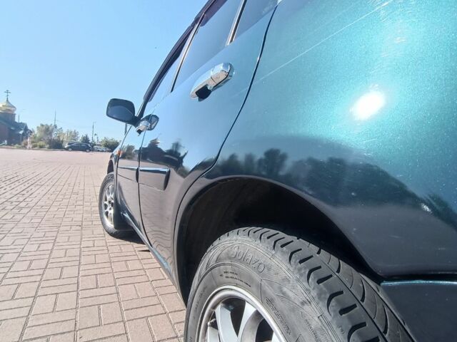 Зеленый Чери Тигго, объемом двигателя 2.4 л и пробегом 235 тыс. км за 3200 $, фото 14 на Automoto.ua