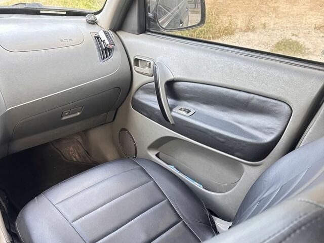 Зеленый Чери Тигго, объемом двигателя 2.4 л и пробегом 212 тыс. км за 4500 $, фото 2 на Automoto.ua