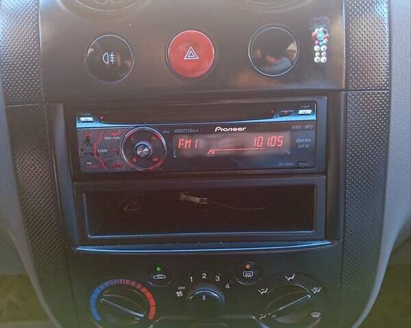 Белый Шевроле Авео, объемом двигателя 1.5 л и пробегом 250 тыс. км за 1950 $, фото 25 на Automoto.ua