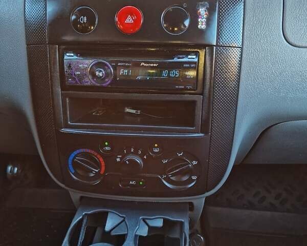 Белый Шевроле Авео, объемом двигателя 1.5 л и пробегом 250 тыс. км за 1950 $, фото 22 на Automoto.ua