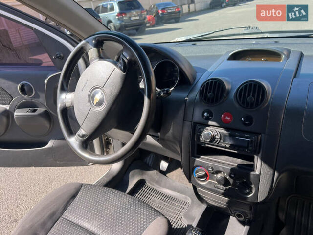 Белый Шевроле Авео, объемом двигателя 1.5 л и пробегом 245 тыс. км за 3000 $, фото 10 на Automoto.ua