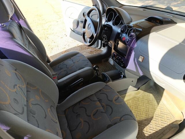 Белый Шевроле Авео, объемом двигателя 1.5 л и пробегом 210 тыс. км за 2400 $, фото 2 на Automoto.ua