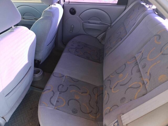 Белый Шевроле Авео, объемом двигателя 1.5 л и пробегом 210 тыс. км за 2400 $, фото 4 на Automoto.ua