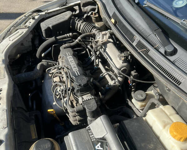 Белый Шевроле Авео, объемом двигателя 1.5 л и пробегом 255 тыс. км за 3200 $, фото 6 на Automoto.ua
