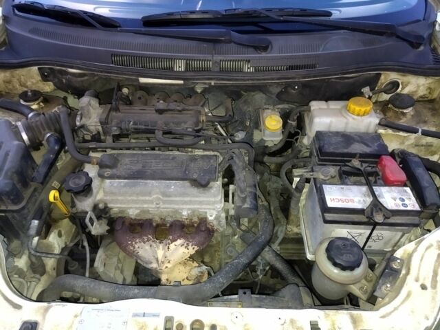 Білий Шевроле Авео, об'ємом двигуна 1.2 л та пробігом 250 тис. км за 3708 $, фото 10 на Automoto.ua