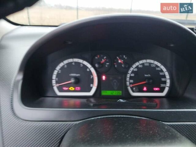 Белый Шевроле Авео, объемом двигателя 1.2 л и пробегом 255 тыс. км за 3709 $, фото 7 на Automoto.ua