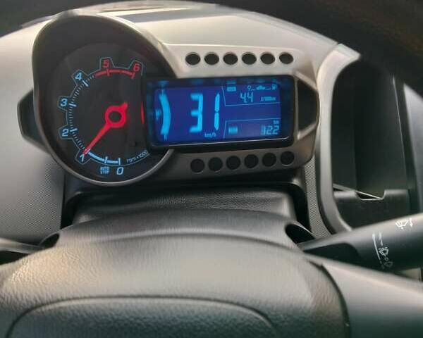 Белый Шевроле Авео, объемом двигателя 1.25 л и пробегом 215 тыс. км за 7000 $, фото 3 на Automoto.ua