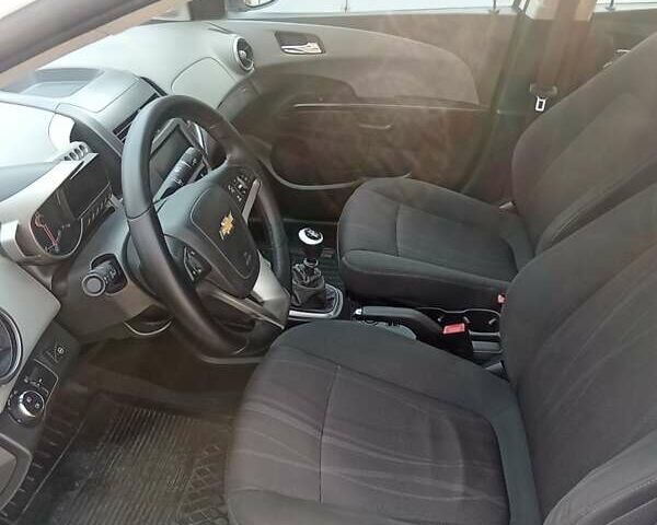 Белый Шевроле Авео, объемом двигателя 1.4 л и пробегом 176 тыс. км за 6400 $, фото 11 на Automoto.ua