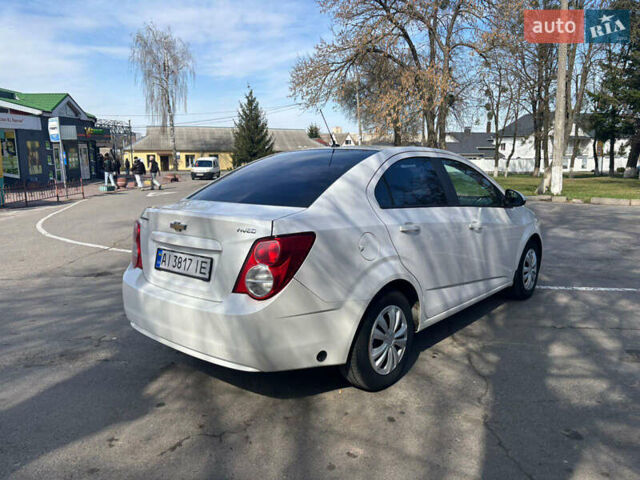 Белый Шевроле Авео, объемом двигателя 1.4 л и пробегом 180 тыс. км за 5500 $, фото 14 на Automoto.ua