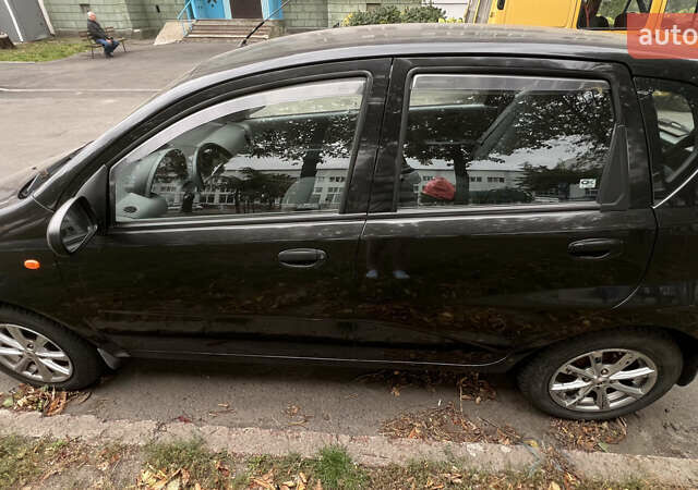 Черный Шевроле Авео, объемом двигателя 1.4 л и пробегом 202 тыс. км за 3600 $, фото 15 на Automoto.ua