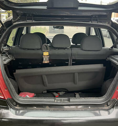 Черный Шевроле Авео, объемом двигателя 1.4 л и пробегом 202 тыс. км за 3600 $, фото 1 на Automoto.ua