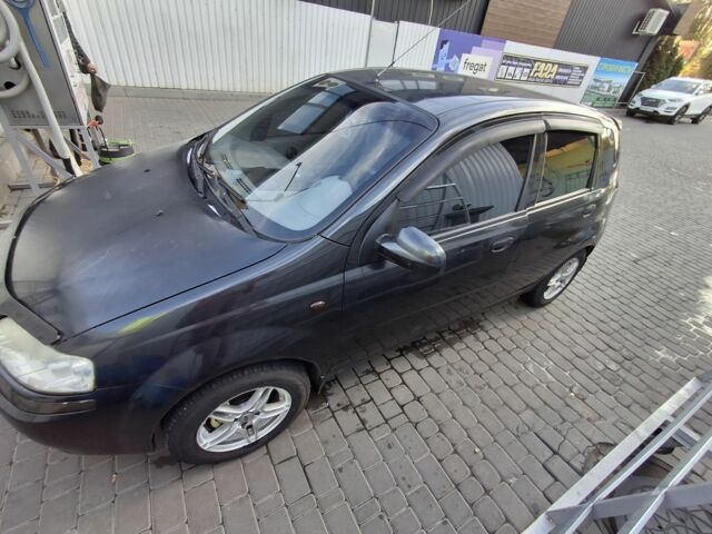 Черный Шевроле Авео, объемом двигателя 1.5 л и пробегом 220 тыс. км за 2000 $, фото 1 на Automoto.ua