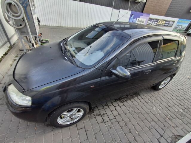 Черный Шевроле Авео, объемом двигателя 1.5 л и пробегом 220 тыс. км за 2000 $, фото 4 на Automoto.ua