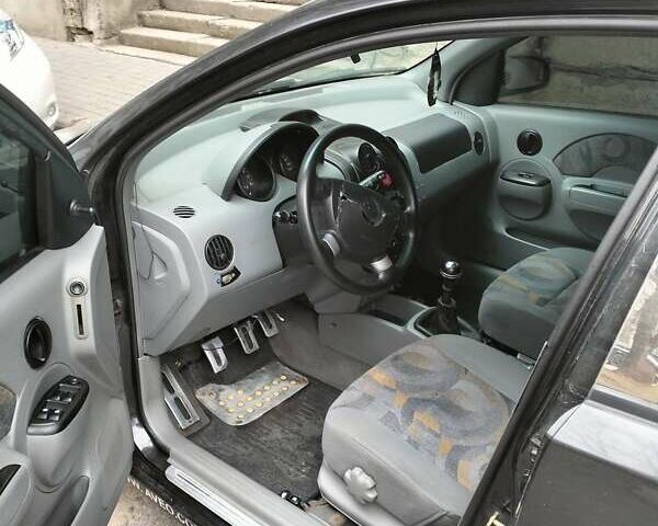 Черный Шевроле Авео, объемом двигателя 1.5 л и пробегом 143 тыс. км за 2000 $, фото 3 на Automoto.ua