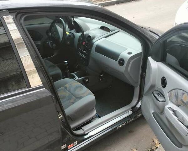 Черный Шевроле Авео, объемом двигателя 1.5 л и пробегом 143 тыс. км за 2000 $, фото 9 на Automoto.ua