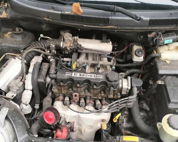 Черный Шевроле Авео, объемом двигателя 1.5 л и пробегом 143 тыс. км за 2000 $, фото 8 на Automoto.ua