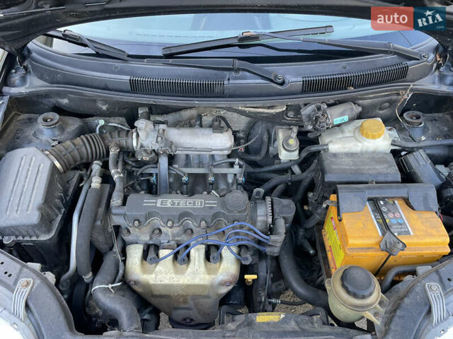 Черный Шевроле Авео, объемом двигателя 1.5 л и пробегом 210 тыс. км за 2750 $, фото 11 на Automoto.ua