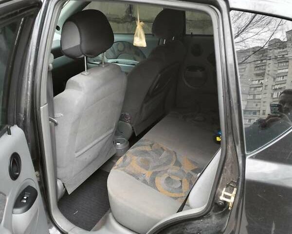 Черный Шевроле Авео, объемом двигателя 1.5 л и пробегом 143 тыс. км за 2000 $, фото 2 на Automoto.ua