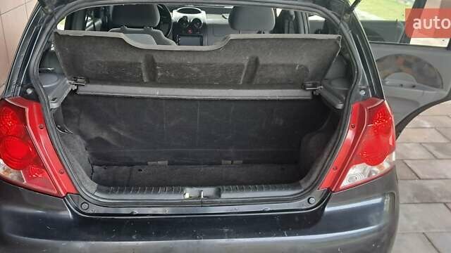 Чорний Шевроле Авео, об'ємом двигуна 1.5 л та пробігом 247 тис. км за 1550 $, фото 1 на Automoto.ua