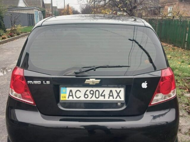 Черный Шевроле Авео, объемом двигателя 10 л и пробегом 185 тыс. км за 3500 $, фото 5 на Automoto.ua