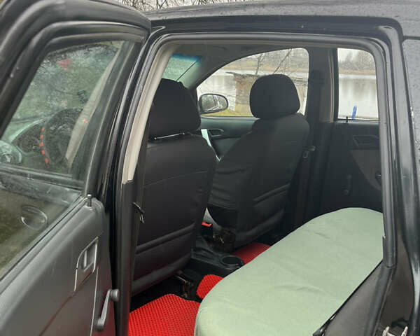 Черный Шевроле Авео, объемом двигателя 1.5 л и пробегом 125 тыс. км за 3000 $, фото 6 на Automoto.ua