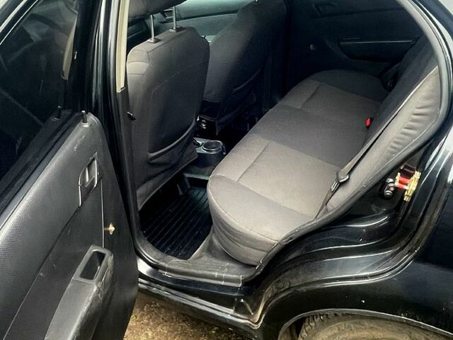 Черный Шевроле Авео, объемом двигателя 1.5 л и пробегом 312 тыс. км за 3100 $, фото 4 на Automoto.ua