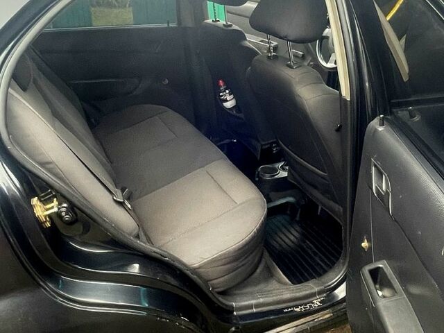 Черный Шевроле Авео, объемом двигателя 1.5 л и пробегом 312 тыс. км за 3100 $, фото 5 на Automoto.ua