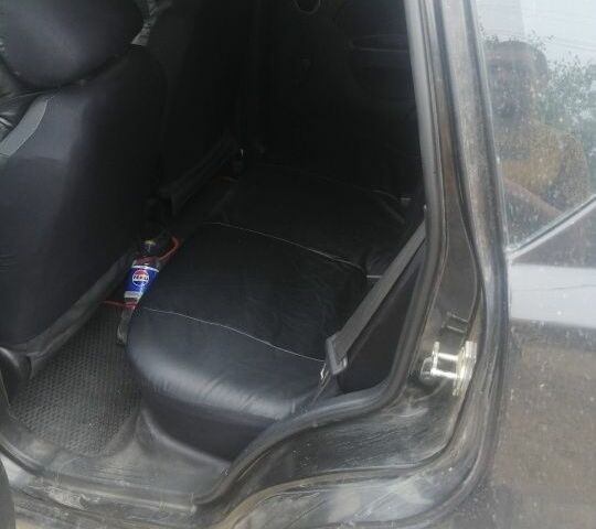 Черный Шевроле Авео, объемом двигателя 1.5 л и пробегом 250 тыс. км за 4000 $, фото 3 на Automoto.ua