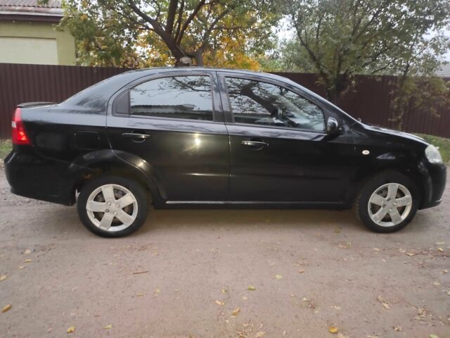 Черный Шевроле Авео, объемом двигателя 1.4 л и пробегом 212 тыс. км за 3200 $, фото 1 на Automoto.ua