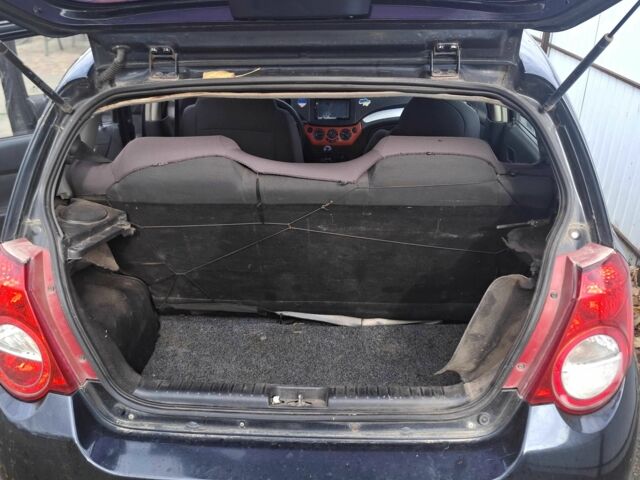 Черный Шевроле Авео, объемом двигателя 1.5 л и пробегом 180 тыс. км за 714 $, фото 1 на Automoto.ua