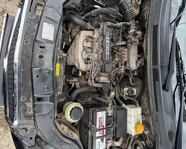 Черный Шевроле Авео, объемом двигателя 1.5 л и пробегом 196 тыс. км за 4500 $, фото 4 на Automoto.ua