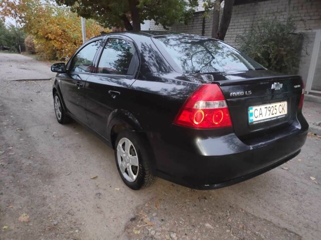 Черный Шевроле Авео, объемом двигателя 1.4 л и пробегом 212 тыс. км за 3200 $, фото 4 на Automoto.ua