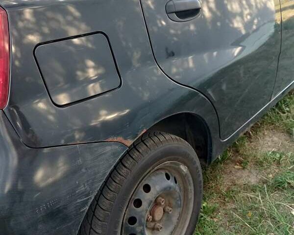 Черный Шевроле Авео, объемом двигателя 1.5 л и пробегом 216 тыс. км за 4000 $, фото 5 на Automoto.ua