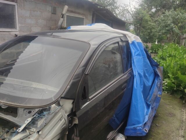 Черный Шевроле Авео, объемом двигателя 1.5 л и пробегом 90 тыс. км за 1500 $, фото 1 на Automoto.ua