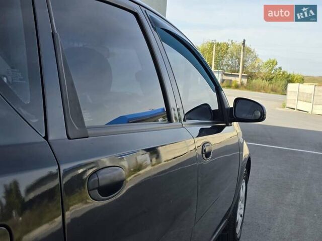 Черный Шевроле Авео, объемом двигателя 1.5 л и пробегом 220 тыс. км за 1999 $, фото 17 на Automoto.ua