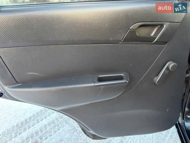 Черный Шевроле Авео, объемом двигателя 1.5 л и пробегом 170 тыс. км за 5450 $, фото 39 на Automoto.ua