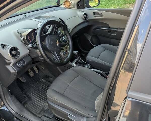 Чорний Шевроле Авео, об'ємом двигуна 1.23 л та пробігом 79 тис. км за 5800 $, фото 1 на Automoto.ua