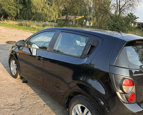 Чорний Шевроле Авео, об'ємом двигуна 1.4 л та пробігом 184 тис. км за 6500 $, фото 4 на Automoto.ua