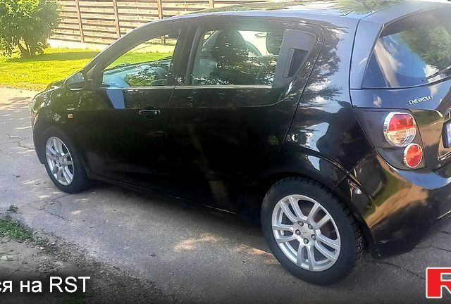 Черный Шевроле Авео, объемом двигателя 1.6 л и пробегом 190 тыс. км за 5500 $, фото 1 на Automoto.ua