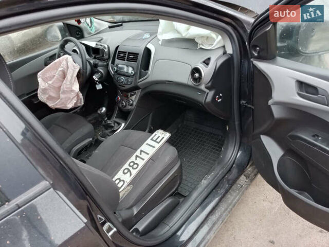 Чорний Шевроле Авео, об'ємом двигуна 1.23 л та пробігом 130 тис. км за 2250 $, фото 5 на Automoto.ua