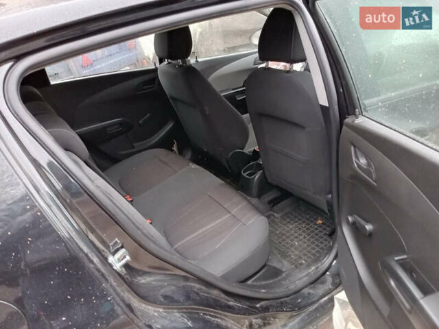 Чорний Шевроле Авео, об'ємом двигуна 1.23 л та пробігом 130 тис. км за 2250 $, фото 4 на Automoto.ua