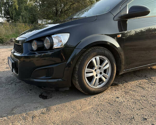Чорний Шевроле Авео, об'ємом двигуна 1.4 л та пробігом 184 тис. км за 6500 $, фото 1 на Automoto.ua