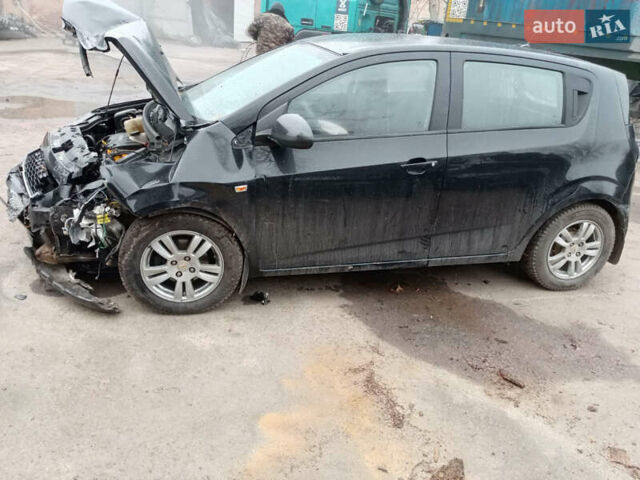 Чорний Шевроле Авео, об'ємом двигуна 1.23 л та пробігом 130 тис. км за 2250 $, фото 3 на Automoto.ua
