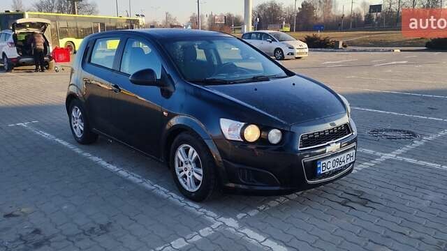 Черный Шевроле Авео, объемом двигателя 1.2 л и пробегом 203 тыс. км за 3950 $, фото 2 на Automoto.ua