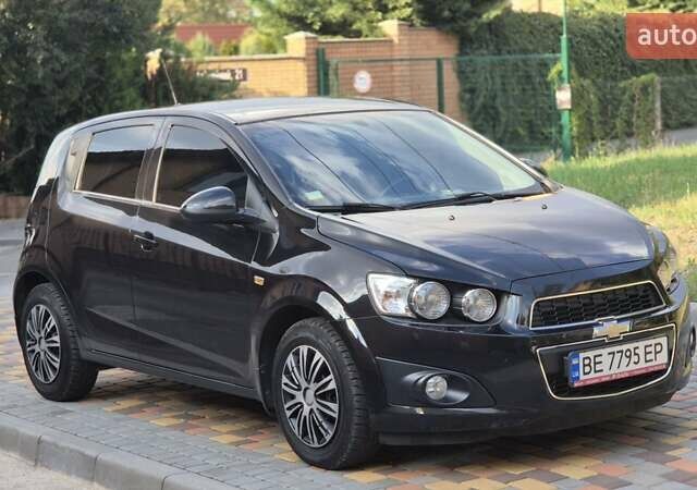 Черный Шевроле Авео, объемом двигателя 1.6 л и пробегом 168 тыс. км за 6650 $, фото 22 на Automoto.ua