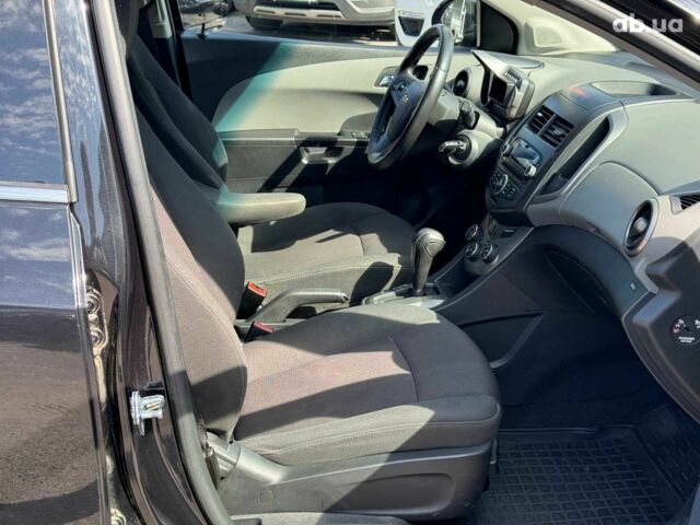 Черный Шевроле Авео, объемом двигателя 1.6 л и пробегом 135 тыс. км за 7690 $, фото 22 на Automoto.ua