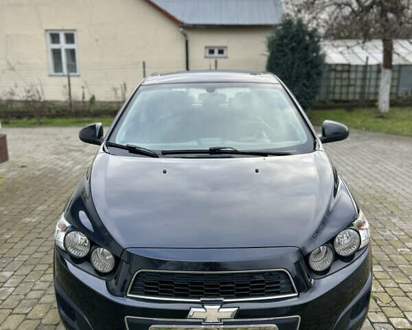 Черный Шевроле Авео, объемом двигателя 1.25 л и пробегом 191 тыс. км за 6000 $, фото 7 на Automoto.ua