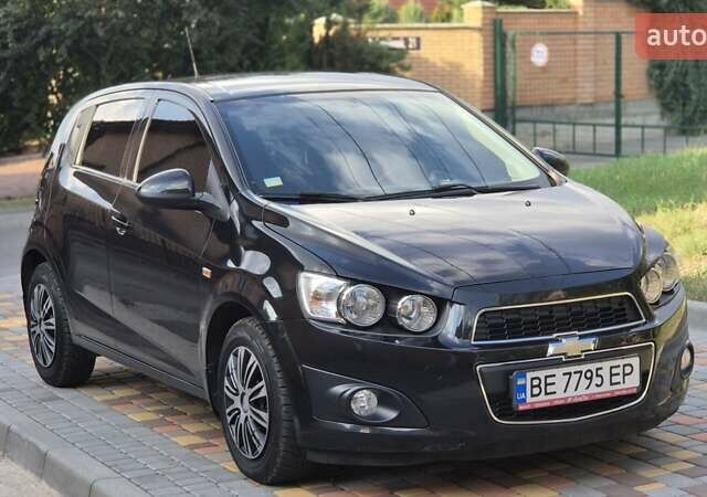 Черный Шевроле Авео, объемом двигателя 1.6 л и пробегом 168 тыс. км за 6650 $, фото 28 на Automoto.ua