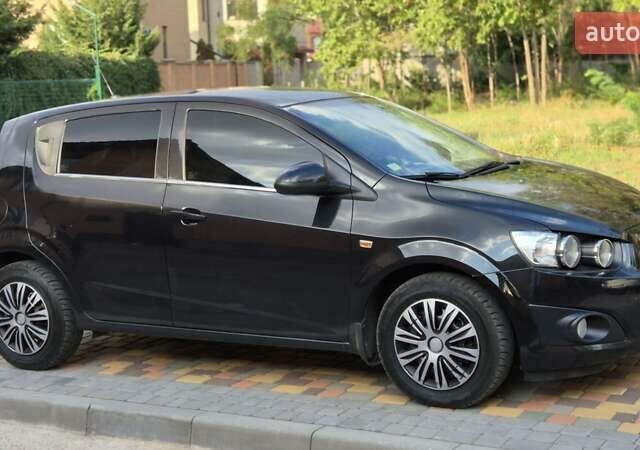 Черный Шевроле Авео, объемом двигателя 1.6 л и пробегом 168 тыс. км за 6650 $, фото 29 на Automoto.ua
