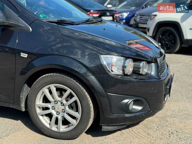 Черный Шевроле Авео, объемом двигателя 1.6 л и пробегом 135 тыс. км за 7690 $, фото 3 на Automoto.ua